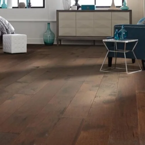 Article on engineered versus solid hardwood flooring provided by {{ name }} in {{ location}}